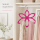 Schalbügel pink in Blütenform mit Samtoberfläche