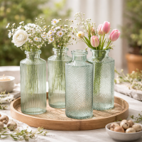 Blumenvase im 4er Set aus Glas in Flaschenform - Salbeigrün