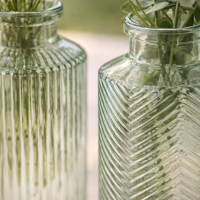 Blumenvase im 4er Set aus Glas in Flaschenform - Salbeigrün